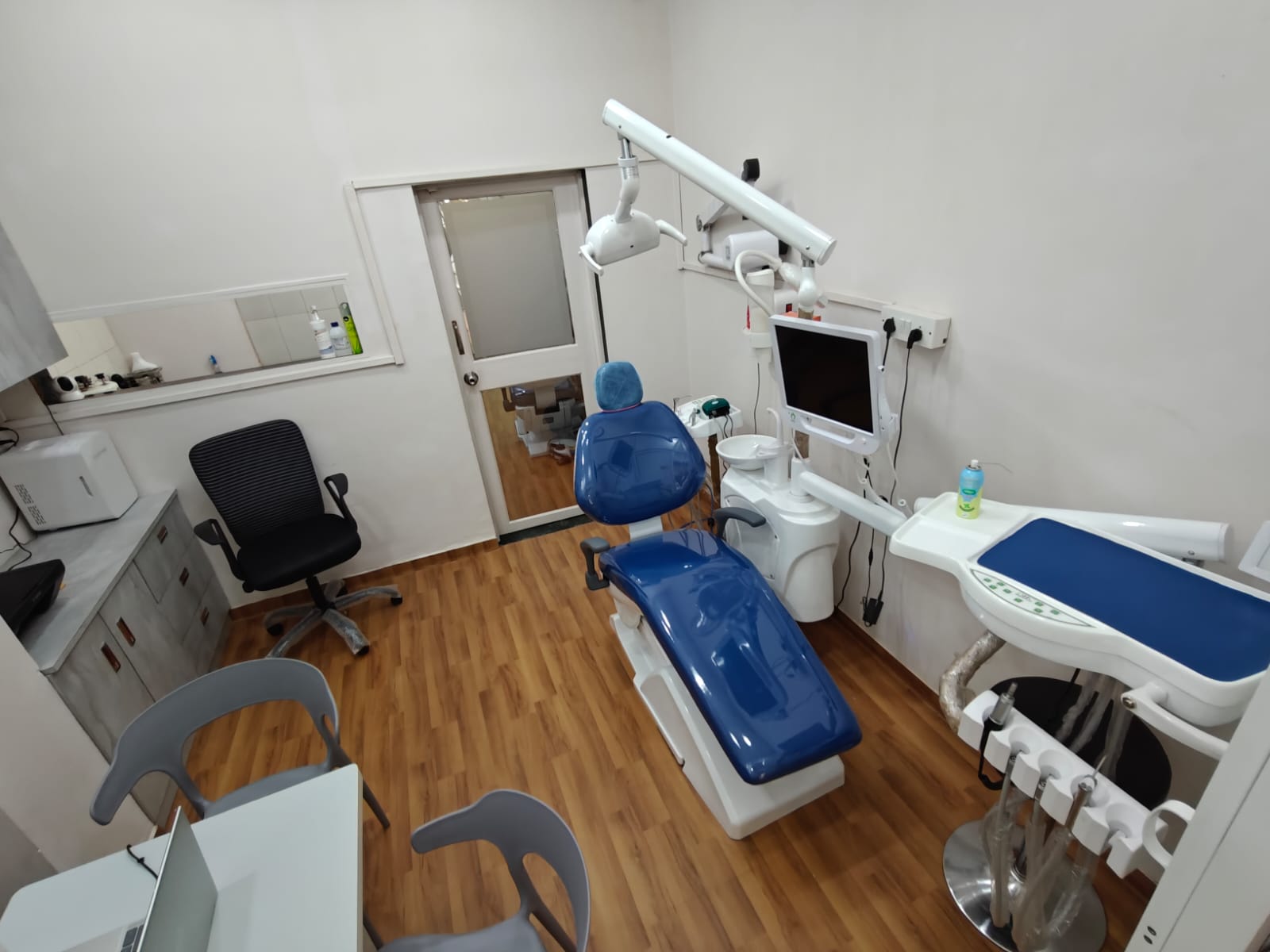 Dental Clinic - Doctor treating patient